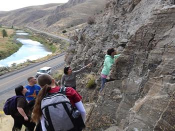 GEOL 101 students investigating cross-bedding in Carlin Canyon.